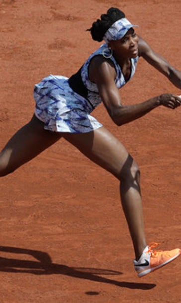 The Latest: Wozniacki advances to 3rd round at French Open